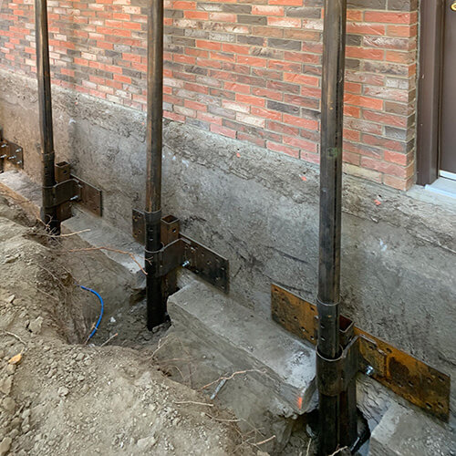 Sinking foundation supported with underpinning repair in Edmonton.